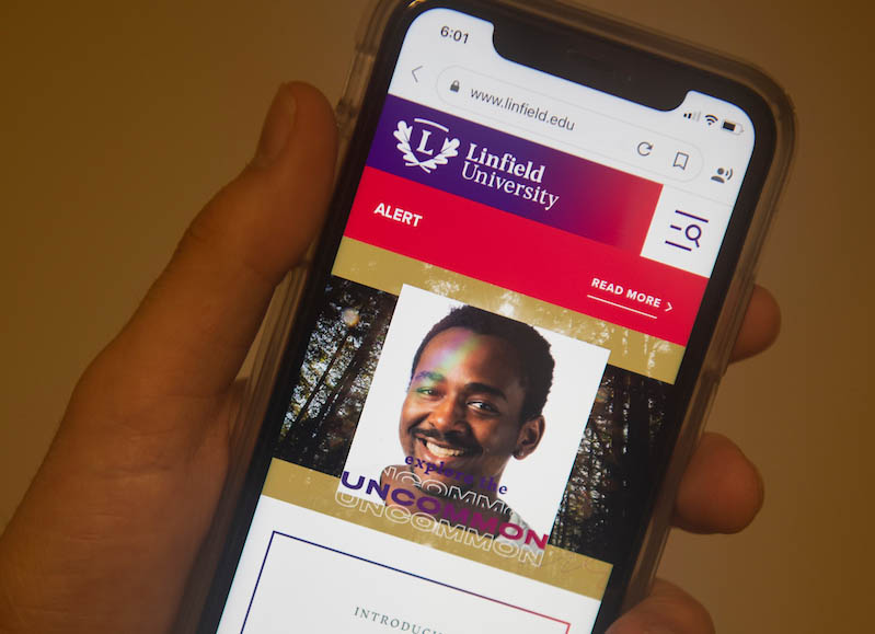 Phone showing the new Linfield website