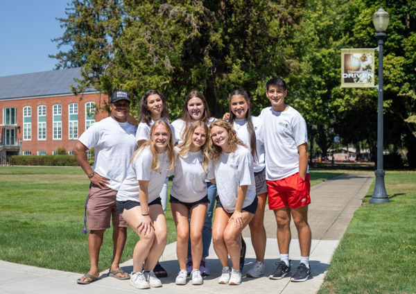 Eight members of 2023-24 ASLU leadership in the academic quad.