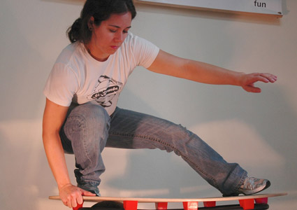 Elysia Tsai '99 demonstrating a Si Board