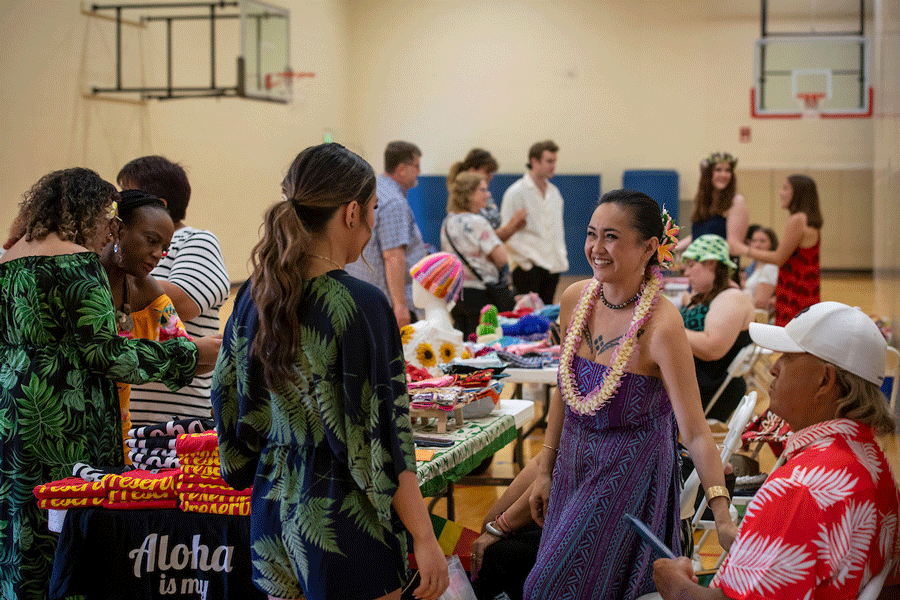 Shoppers browsing booths at the event's country store.