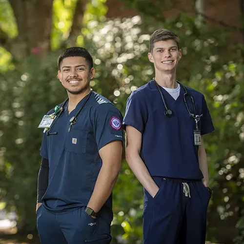 photo of Miguel and Carson standing next to each other.