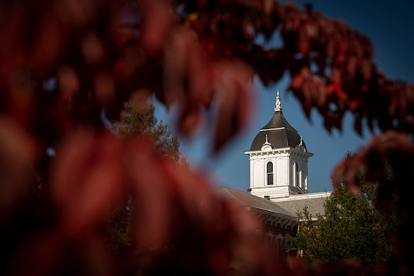 Pioneer Hall through the trees