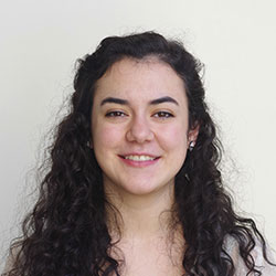 female student passport photo on white backdrop