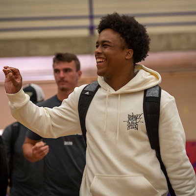 male student receiving his acorn at Linfield's opening Convocation ceremony 2022