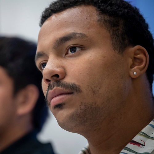 MS in business student listening in class