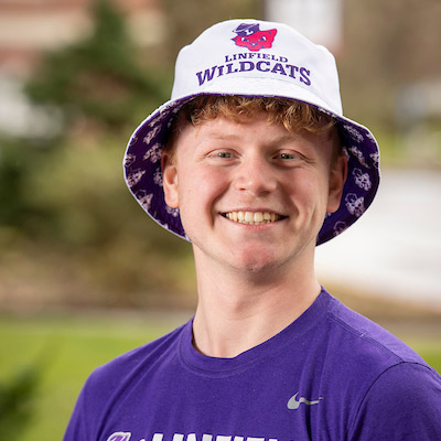 Male student in Linfield gear.