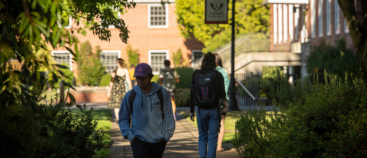 Students walking on campus on the first day of fall 2022